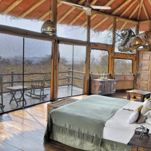 Lodge mit Doppelbett und privater Veranda